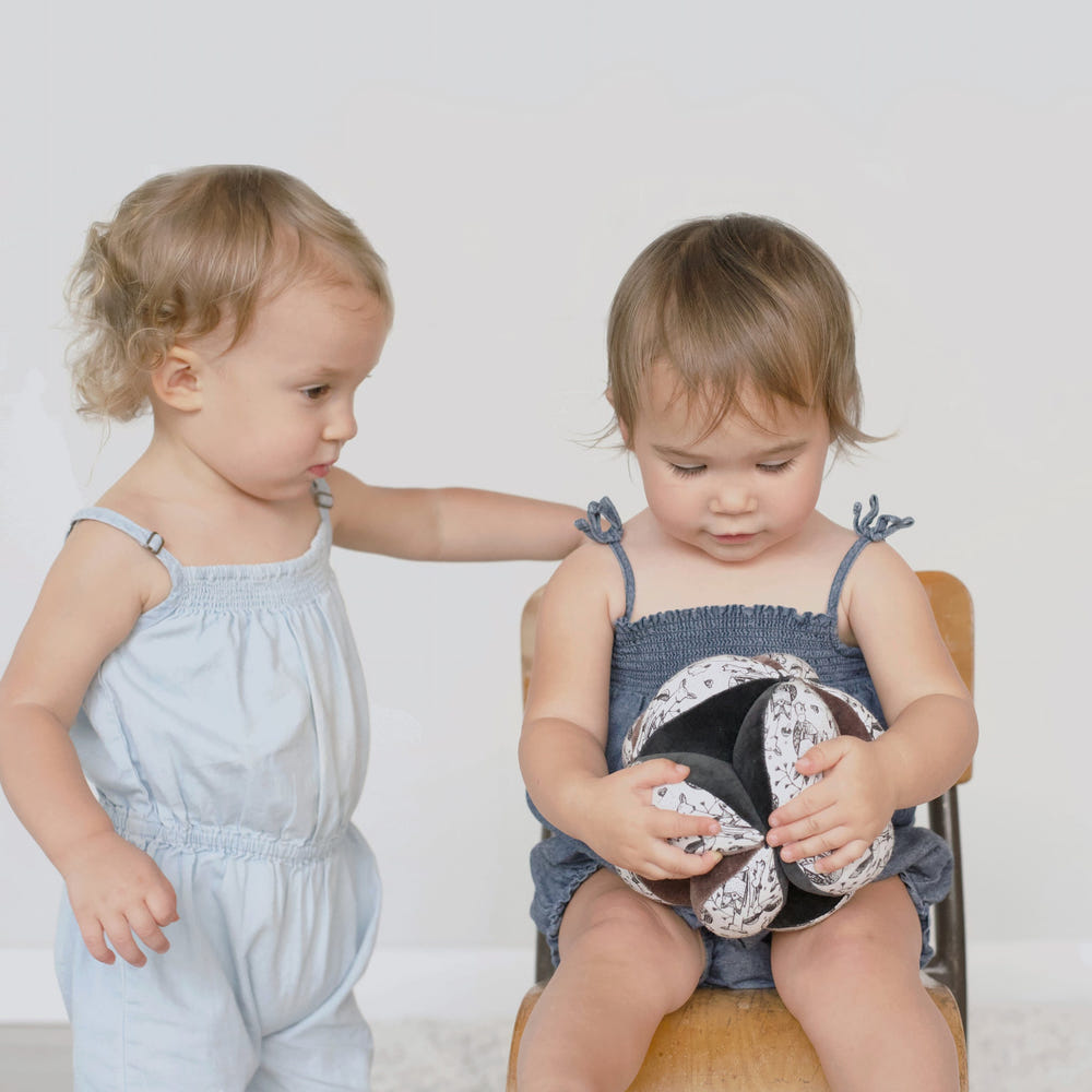 Clutch Ball - Woodland: Soft, colorful baby toy for sensory play and motor skill development. Perfect for infants and toddlers.