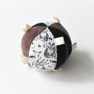 Woodland Taggy Ball with Rattle for babies - soft, colorful toy for sensory play and development.