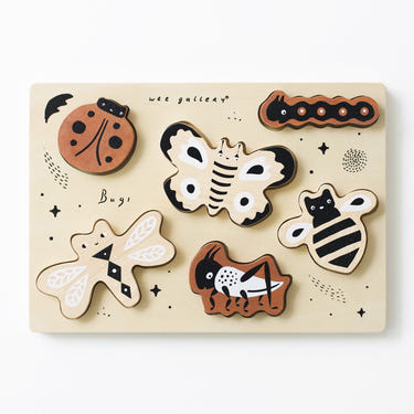Wooden tray puzzle featuring colorful bugs, perfect for toddlers' learning and playtime.