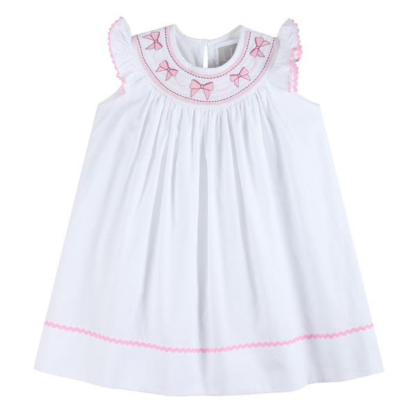 White and pink bows smocked bishop dress for baby girls, perfect for special occasions.