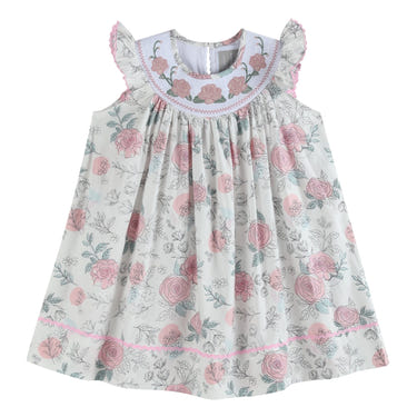 White and pink floral smocked bishop dress for babies, perfect for special occasions and everyday wear.