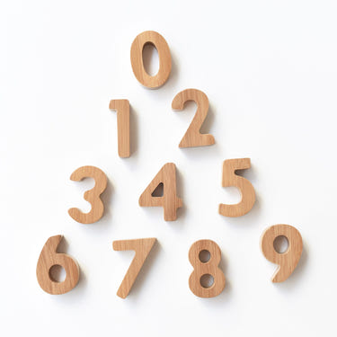 Bamboo Numbers wooden toy set for babies, promoting early learning and development.