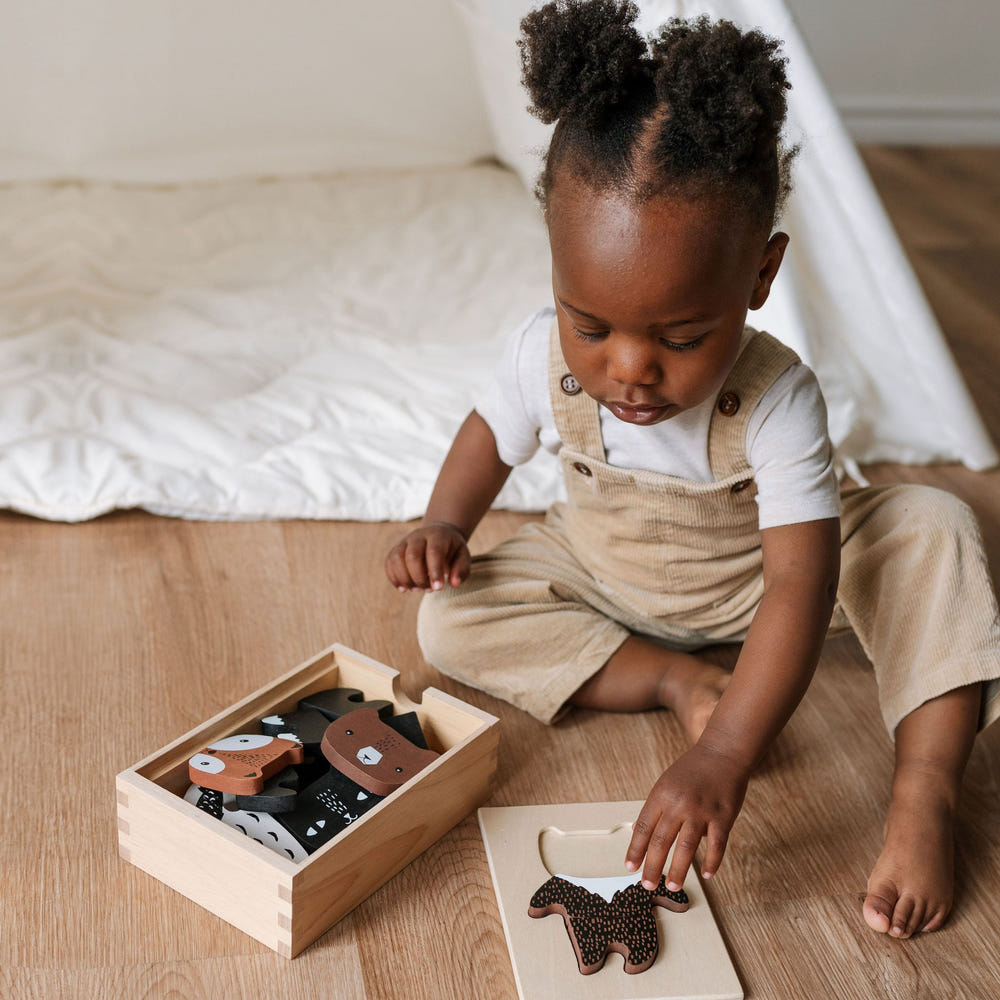 Colorful Mix & Match Animal Tiles wooden toy for babies, promoting creativity and fine motor skills.