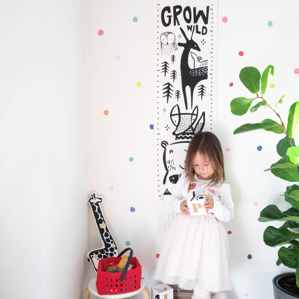 Woodland canvas growth chart for kids' decor, featuring charming forest animals and a playful design.