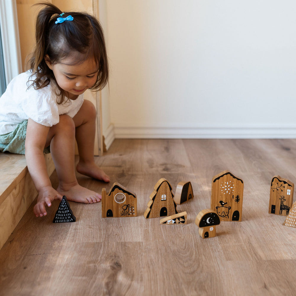 Woodland Village wooden and bamboo toy set for imaginative play, featuring charming forest-themed characters and structures.