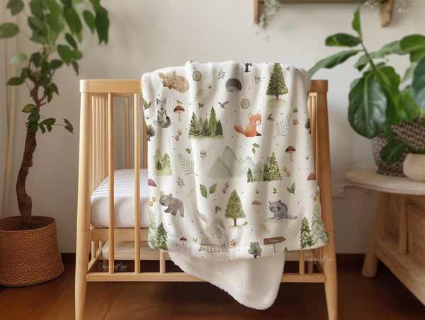 Vintage baby blanket featuring adorable baby animals, perfect for cozying up your little one.