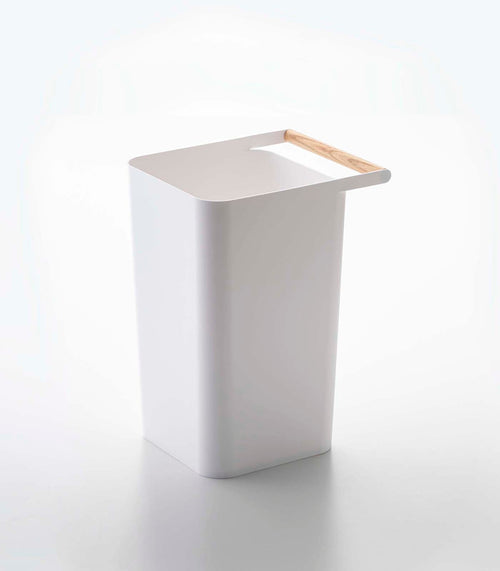 Stylish baby trash can for nursery, perfect for discreetly disposing of diapers and waste.