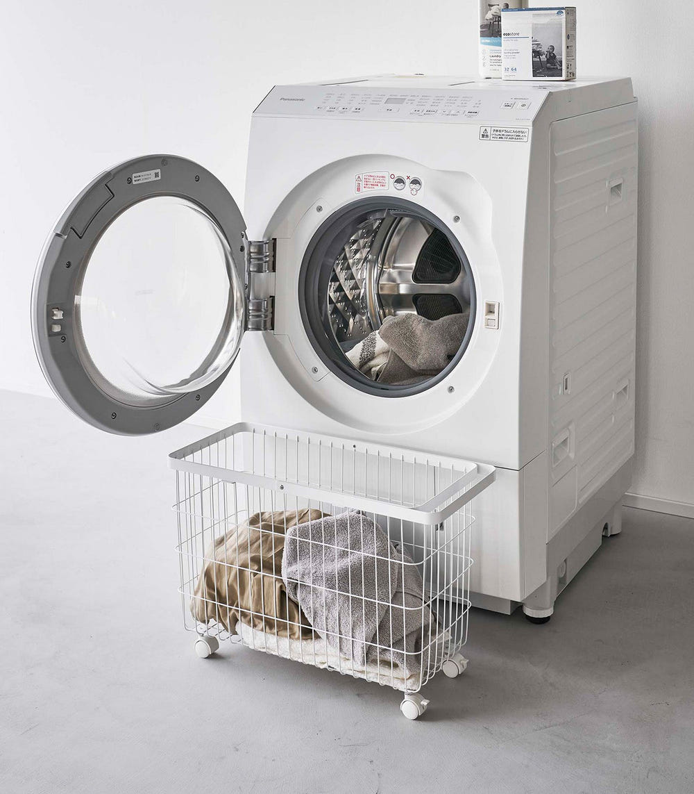 Rolling wire laundry basket in steel, 14.8" H, perfect for organizing baby clothes and essentials.