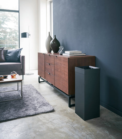 Stylish steel trash can for baby rooms, shown at angle 6, perfect for discreet waste disposal.