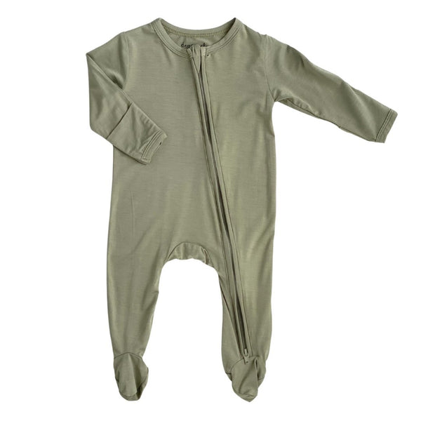 Zippered footie in apricot for babies, perfect for cozy sleep and bedding. Angle 4 view showcasing design details.