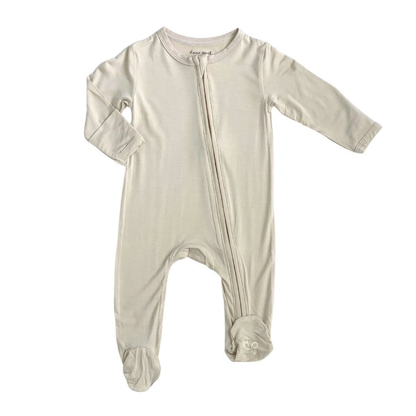 Zippered footie in apricot for babies, perfect for comfortable sleep and cozy bedding. Angle 5 view.