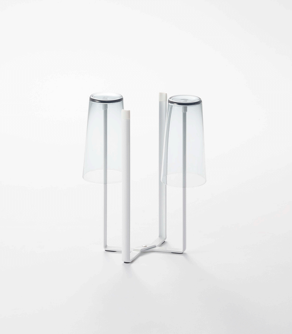 Collapsible steel bottle dryer at angle 2, perfect for efficient drying of baby bottles and accessories.