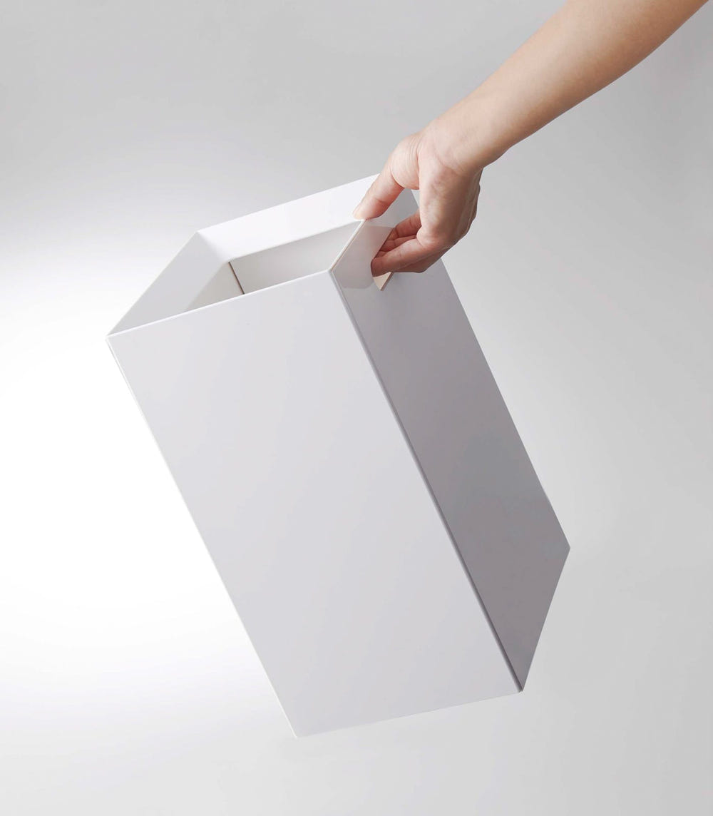 "Stylish baby trash can for nursery, perfect for easy waste disposal and maintaining a clean environment."